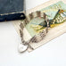 Vintage silver  bar gate bracelet with a heart-shaped padlock charm with an old box and vintage postcard