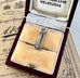 Vintage silver Rome columns charm on a vintage jewellery box