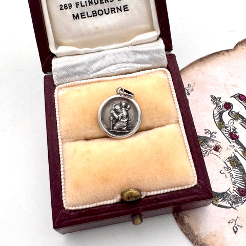 Vintage silver St Christopher charm in a jewellery box