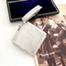 Vintage 1935 hallmarked vesta case made by G&SC Ltd of Regent St, London with a black box and vintage photo of children on a white background