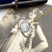 Vonk Jewellery antique silver threepence and pearl necklace with a vintage postcard