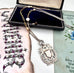 Vonk Jewellery 1898 sterling silver watch fob necklace with a vintage postcard and jewellery box