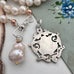 Vonk Jewellery 1900 watch fob and pearl necklace with a vintage postcard and jewellery box