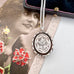 Vonk Jewellery 1884 Victorian silver locket on a vintage post card and a vintage jewellery box