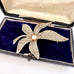 Vonk Jewellery vintage rhodium plated marcasite flower brooch in a vintage jewellery box