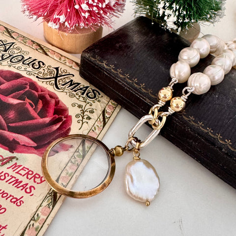 Vonk Jewellery antique gold tone locket pearl necklace on vintage postcards and a vintage box