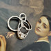 Vonk Jewellery vintage silver engagement, wedding and eternity ring charm on a portrait of a Victorian woman