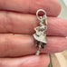 Vonk Jewellery vintage sterling silver Scottish Highland Dancer charm in a woman's hand