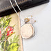 Vonk Jewellery vintage sterling silver locket with a vintage postcard and jewellery box