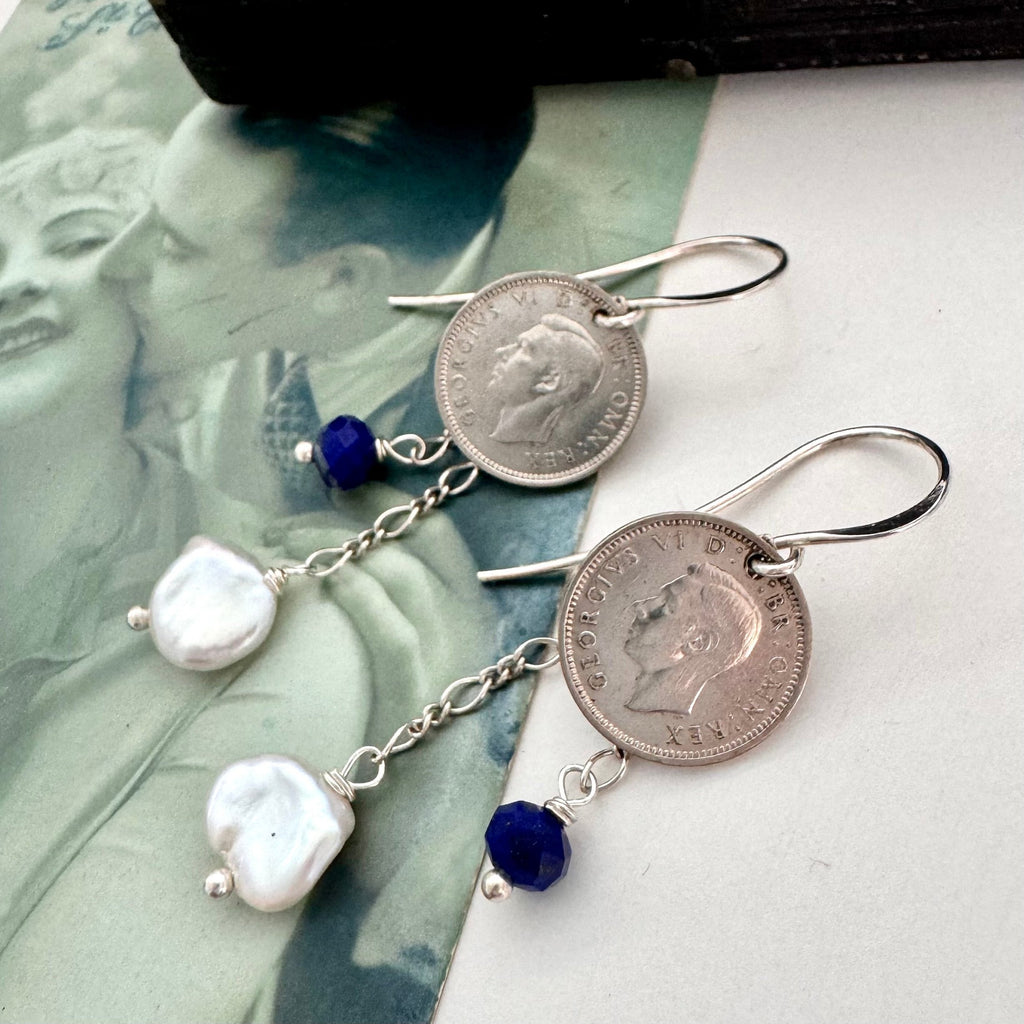 Vonk Jewellery vintage  coin and pearl earrings on a vintage postcard