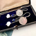 Vonk Jewellery vintage  coin and pearl earrings on a vintage postcard