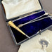 Vonk Jewellery antique pocket watch key necklace on a vintage jewellery box.