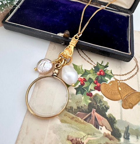 Vonk Jewellery double sided photo locket on a vintage Christmas postcard