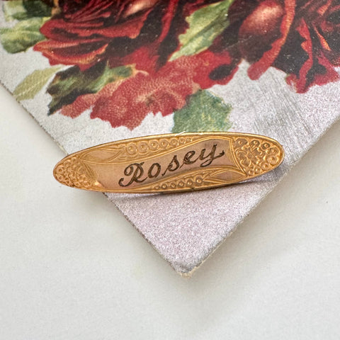 Antique 9ct gold lined brooch with 'Rosey' engraving on a floral background