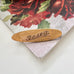 Antique 9ct gold lined brooch with 'Rosey' engraving on a floral background