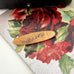 Antique 9ct gold lined brooch with 'Rosey' on a floral background