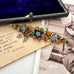 Vonk jewellery antique Czech crystal brooch on vintage postcards and with a vintage jewellery box