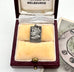 Antique silver charm commemorating the coronation of George   and Queen Mary in a jewellery box