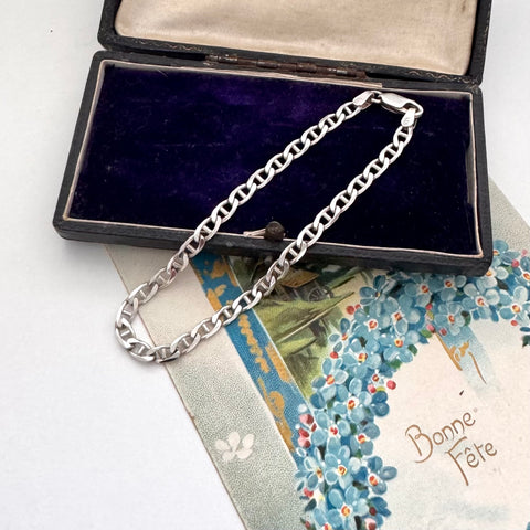 Vonk Jewellery sterling silver mariner link bracelet on an old jewellery box and on a vintage Christmas postcard