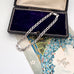 Vonk Jewellery sterling silver mariner link bracelet on an old jewellery box and on a vintage Christmas postcard