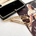 Vintage Sarah Coventry signed "stunning" gold tone brooch on an old jewellery box and with a vintage postcard