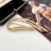 Vintage Sarah Coventry signed "stunning" gold tone brooch on an old jewellery box and with a vintage postcard