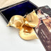SOLD Vintage Sarah Coventry Golden Trillium Flower Brooch