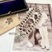Vonk Jewellery heavy sterling silver curb link chain bracelet with heart padlock clasp on vintage postcards and with a vintage jewellery box